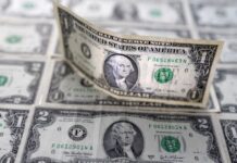 Dollar heads for ninth straight loss as Fed outlook dominates