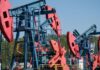 Oil edges down with Ukraine peace talks, US rate decision in spotlight