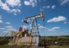 Oil steady on US data, geopolitical tension