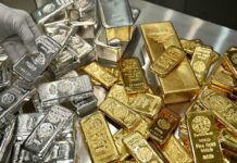 Spot silver extends rally to hit $75 per ounce for first time