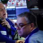 Wall Street lingers around record highs; precious metals rise