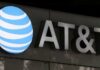 AT&T bets on fiber, spectrum deals to forecast annual profit above expectations