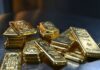 Gold extends record run, races past $5,400/oz