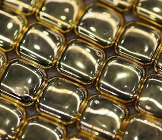 Gold, silver hit records and stocks fall as Trump fans trade fears