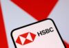 HSBC tops $300 billion market value for first time