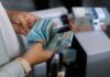 Indonesian stocks tank as downgrade risk sets off rush for exits