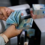 Indonesian stocks tank as downgrade risk sets off rush for exits