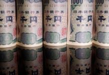 Japan to respond appropriately on forex, finance minister says