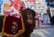 Shares are higher in Asia in an upbeat start to the new year