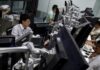 Stocks, dollar take tariff hit; gold gets safety bid