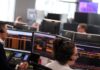 World stocks at record high as earnings hopes offset trade angst