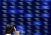 Asia rallies as Japan shares surge to record peak