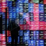 Asian shares step back from record as tech jitters return, bonds rally