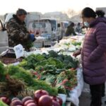 China’s producer deflation persists, consumer inflation cools in Jan