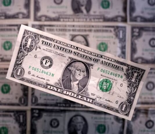 Dollar firms on safe-haven flow, strong US data adds support