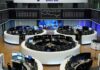 Global stocks slip with earnings and US-Iran tensions in focus