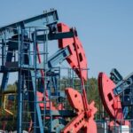 Oil hovers below seven-month high as traders eye US–Iran talks, trade policy