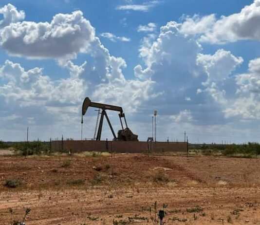 Oil prices down $2 a barrel on supply forecast