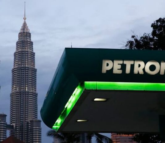 Petronas sees profit slide for third straight year as oil prices weigh on margins
