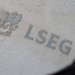 Stocks hit record highs; Treasury yields fall after US data