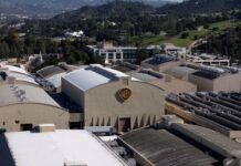 US DOJ probes Warner Bros’ planned sale impact on theaters, Bloomberg News reports