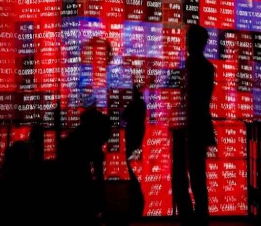 Wall St futures, dollar drop amid US tariff tumult