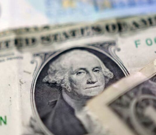 Dollar set for weekly fall as central banks turn hawkish