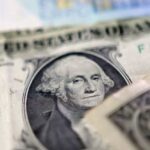 Dollar slides, stocks jump as Trump signals pause on Iran strikes