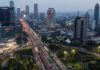 Fitch cuts Indonesia credit rating outlook to negative