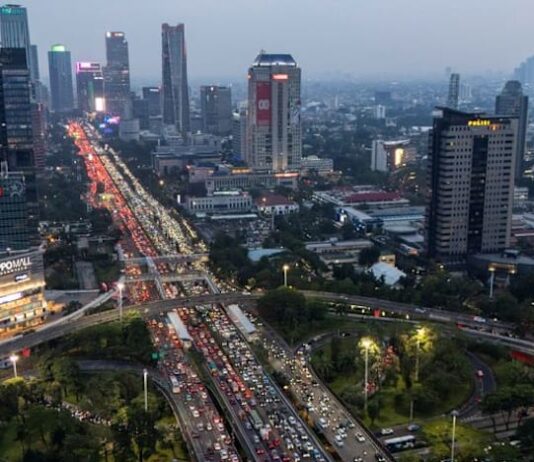 Fitch cuts Indonesia credit rating outlook to negative