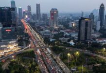 Indonesia media report Fitch cuts country’s rating outlook to negative