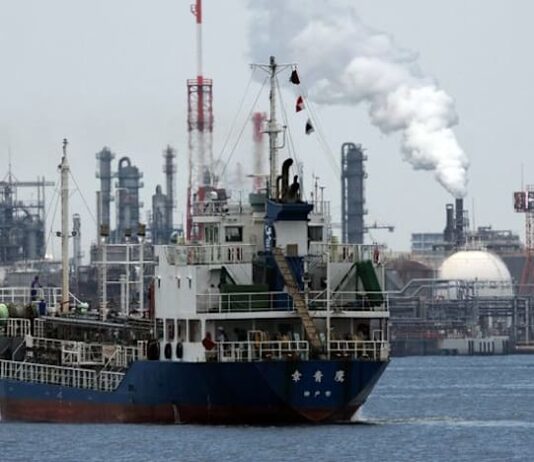 Japan to start releasing oil from joint stockpiles by end-March, PM says