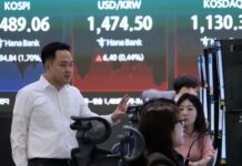 Most Asian equities drop as Mideast crisis rages, though oil dips