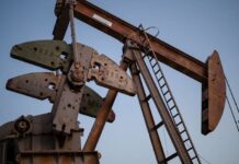 Oil falls as US and allies look to boost supply, unchoke Strait of Hormuz