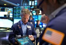 Oil prices slip, stocks rally as Washington, Tehran bicker over talks