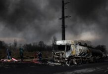 Oil surges, shares skid in Asia as Middle East conflict rages