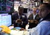 Stocks slide as soaring oil prices and US job losses rattle markets