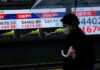 Stocks slide in Asia, Brent crude heads for record monthly rise
