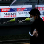 Stocks slide in Asia, Brent crude heads for record monthly rise