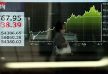 Asian shares track Wall Street to record highs but higher oil prices a risk