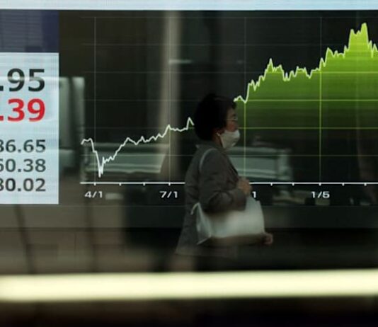 Asian shares track Wall Street to record highs but higher oil prices a risk