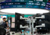 Asian stocks rally, crude drops on lingering hope for a peace deal