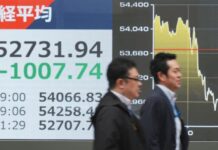 Asian stocks reverse as investors await news on US-Iran peace talks