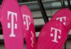 Deutsche Telekom shares slip after T-Mobile merger talks reports