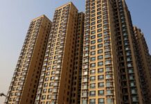 Evergrande liquidators enter exclusive talks to sell majority stake in property services arm