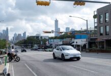 Musk sounds cautious tone on robotaxis amid slower-than-expected rollout