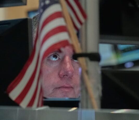 S&P 500, Nasdaq end at records as Intel shares surge