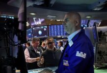 Stocks hit record on hopes of US-Iran peace deal, but doubts lift oil