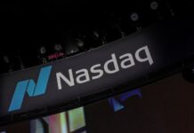 Trading Day: Nasdaq notches 12-day winning streak as Middle East peace talks progress