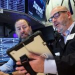 US stocks gain, dollar dips on hopes for Iran war negotiations